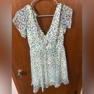 Cream dress with green and blue accents